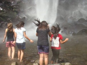 Entering the pool of Coban Rondo Waterfal